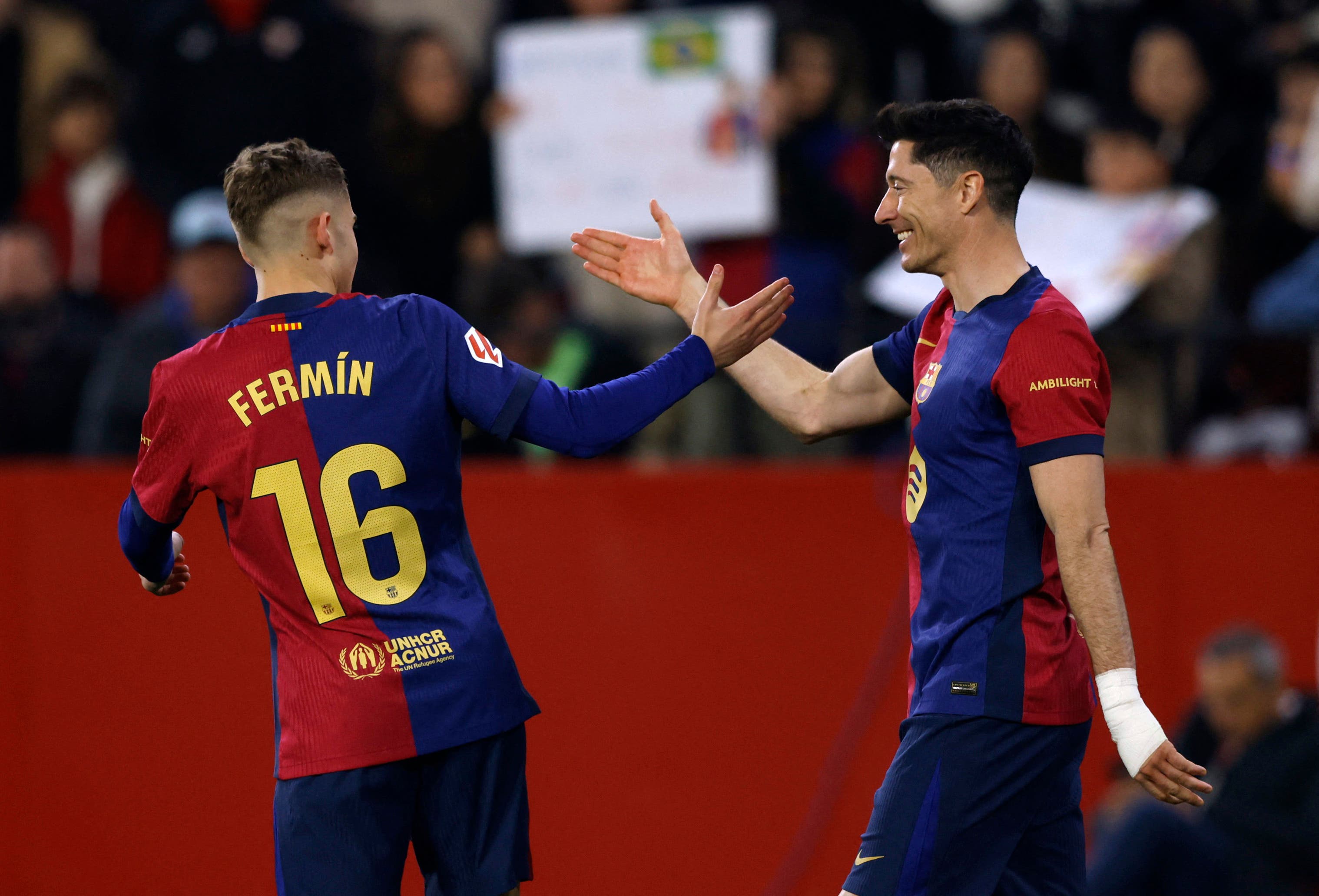 FC Barcelona's Fermin Lopez celebrates scoring their second goal with Robert Lewandowski